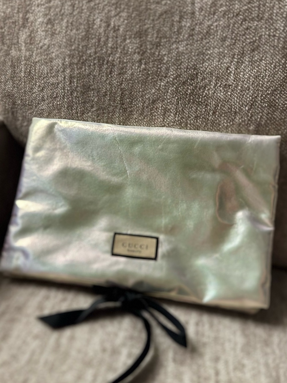 Gucci Iridescent Pearl Clutch with Black Ribbon